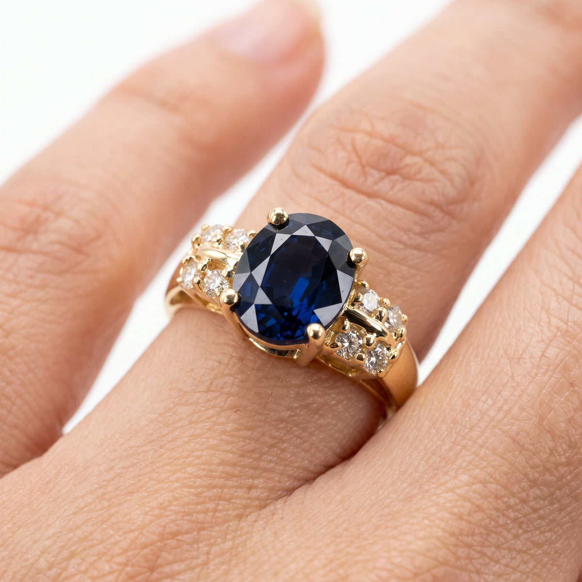 6.75x8.25mm Oval Sapphire & 8-Diamond Ring