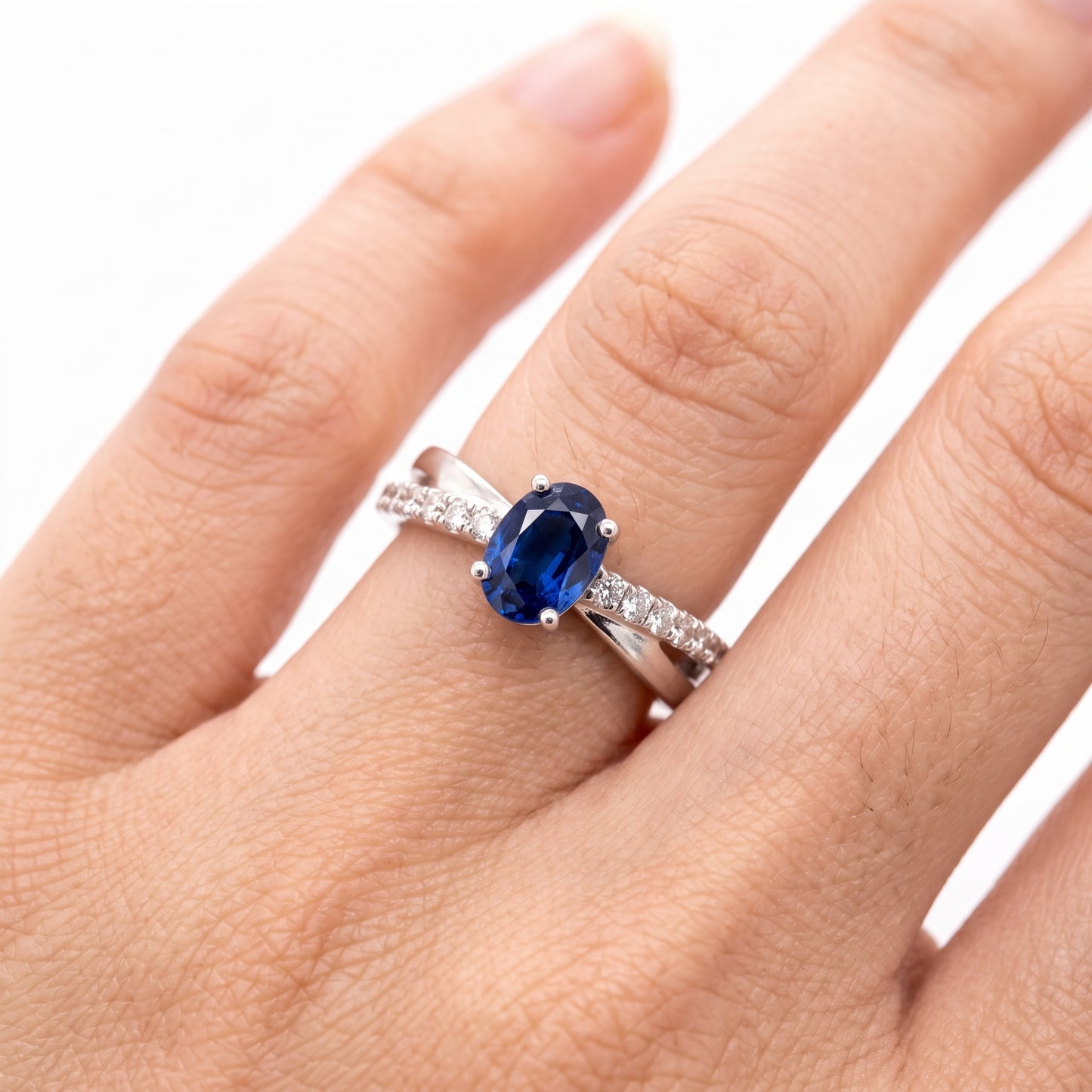 5x7mm Oval Sapphire & 14-Diamond X Ring