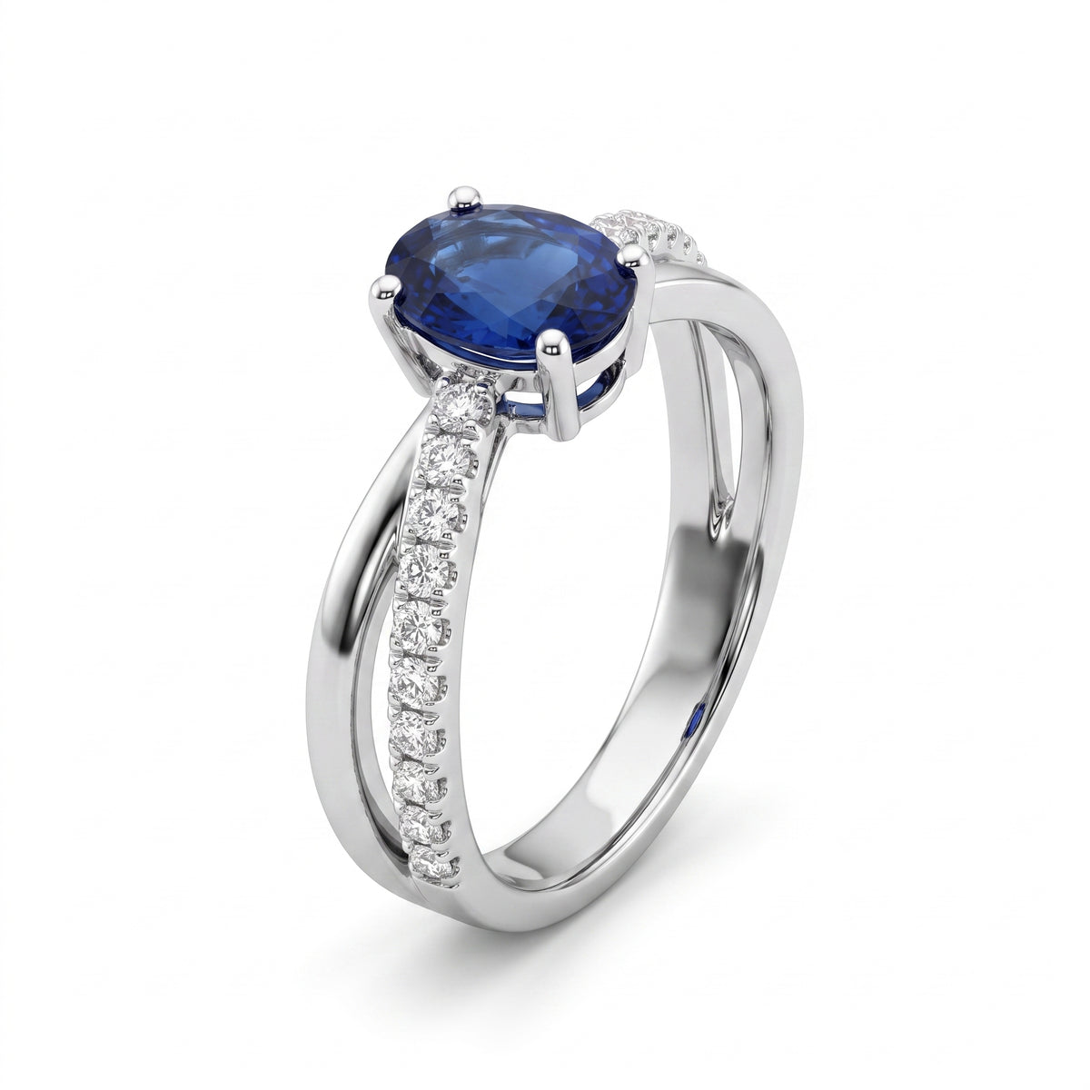5x7mm Oval Sapphire & 14-Diamond X Ring