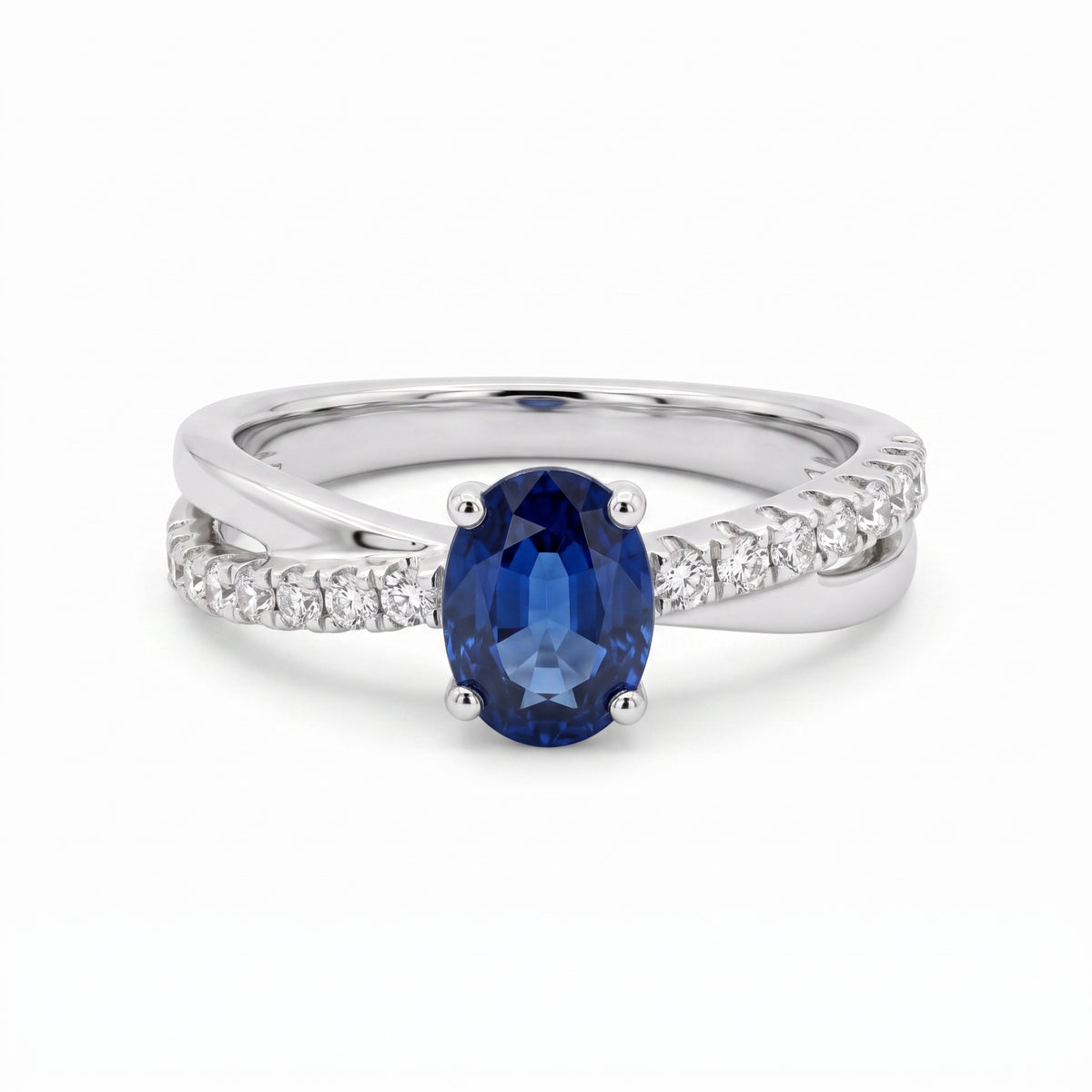 5x7mm Oval Sapphire & 14-Diamond X Ring
