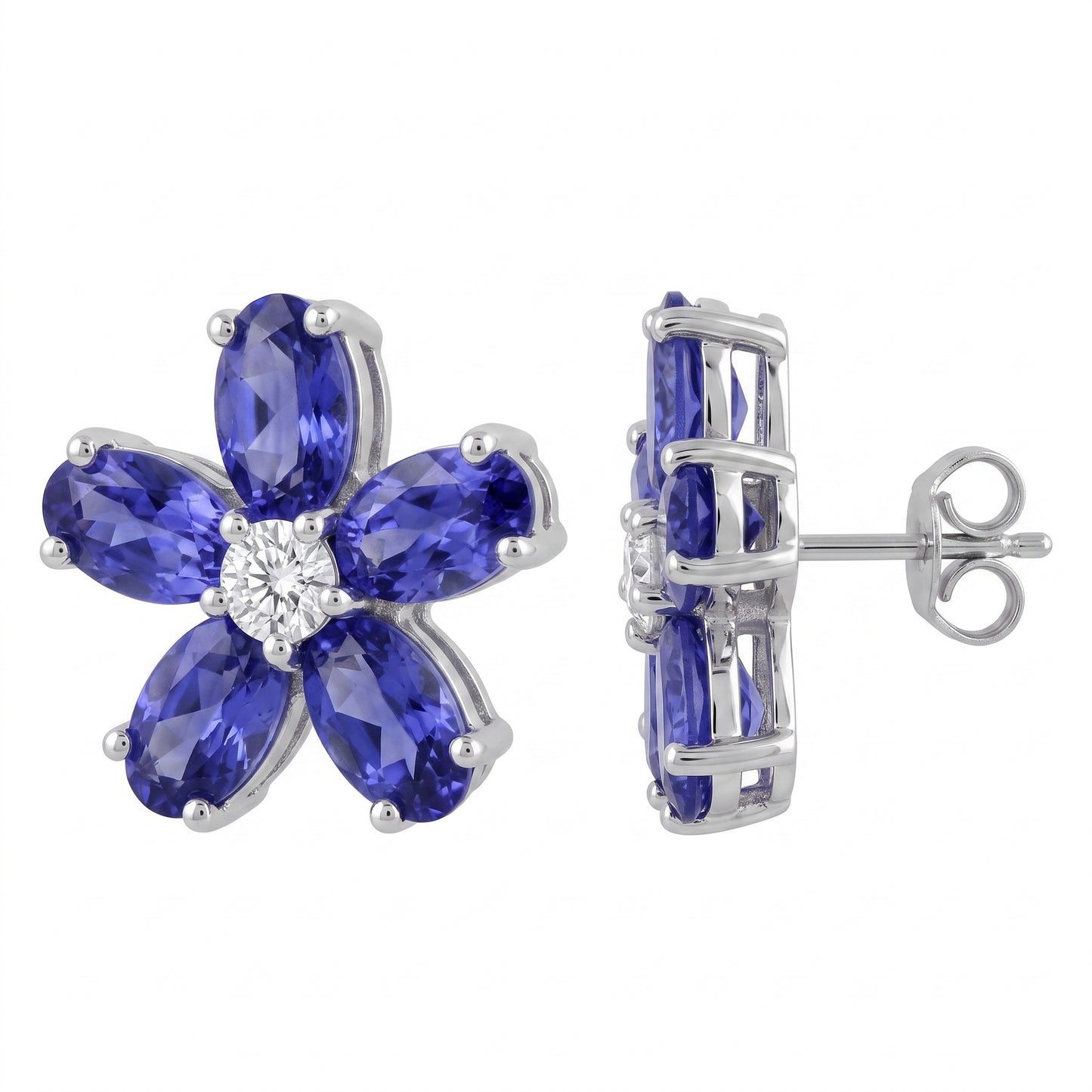 18k white gold ten oval 3x5mm tanzanite and two round diamond flower post earrings, angled view showing post and butterfly back, white background