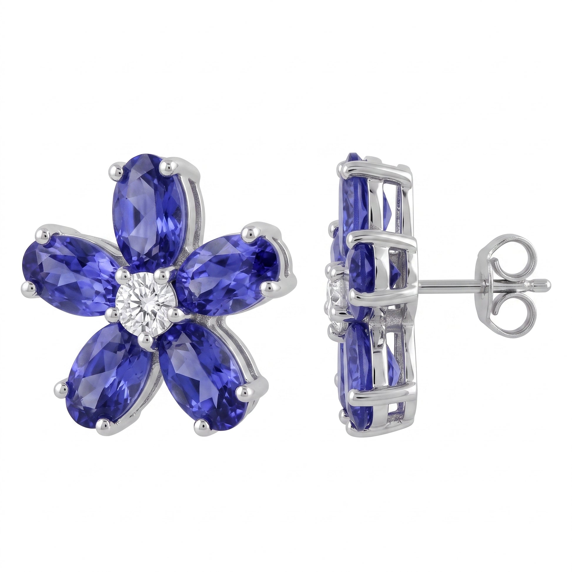 18k white gold ten oval 3x5mm tanzanite and two round diamond flower post earrings, angled view showing post and butterfly back, white background