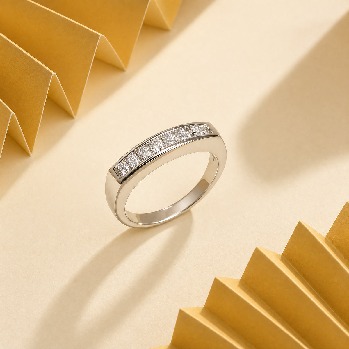 18K White Gold Pear-Cut Diamond Channel Ring - Scene